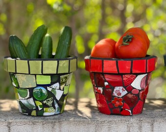 A pair of mosaic pots that add a point of color to any space in the house or yard