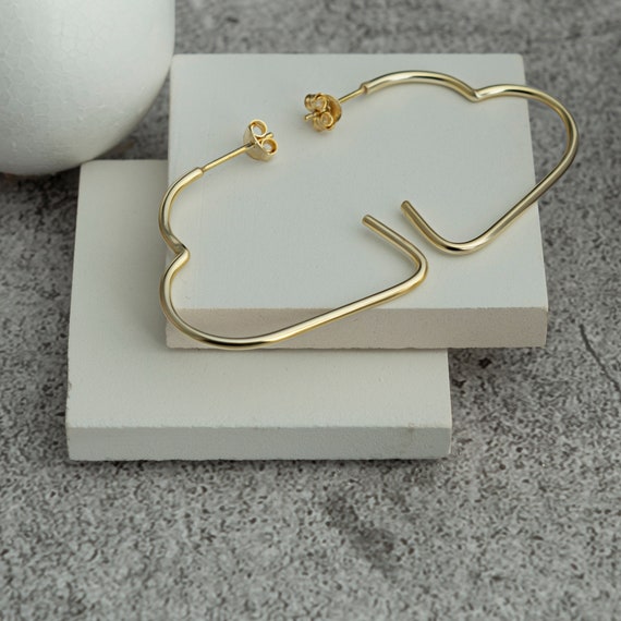 Half heart best sale earrings