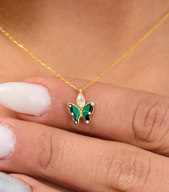 Green butterfly best sale necklace
