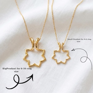 May include: Two gold-toned necklaces featuring open, star-shaped pendants. The larger pendant is labeled Big Pendant for 6-10 ring size, and the smaller pendant is labeled Small Pendant for 4-6 ring size, with black arrows pointing to each item.