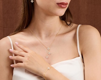 Sierlijke klavertje vier sieradenset: sterlingzilveren zirkoonketting, armband en oorbellen