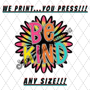 May include: A colorful tie-dye sunflower with the words "Be Kind" in a bold, outlined font. The words are in pink, yellow, orange, and blue. The background is white with a subtle pattern.