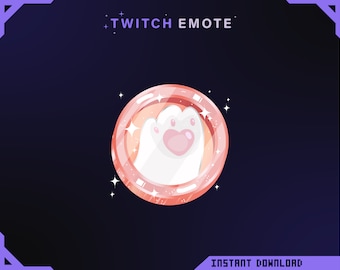 May include: A pink and white animated Twitch emote featuring a cartoon paw print with a pink heart on the pad. The paw print is surrounded by a pink circle with a sparkly border. The background is a dark blue.