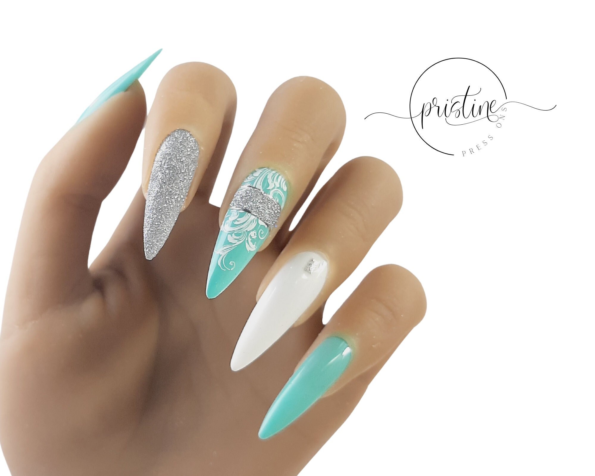 Mint Green Stiletto Nails