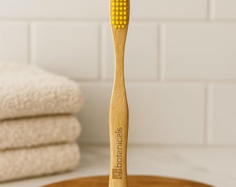Spazzolino da denti in bambù ecologico, senza plastica, per l'igiene orale, colore giallo.