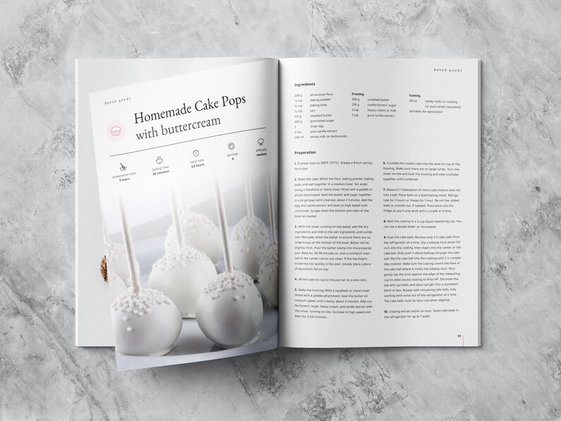 This mockup shows a spread of a Cake Pops-recipe. On the picture are white cakepops. Ingredients and preparation is described on a whole page.