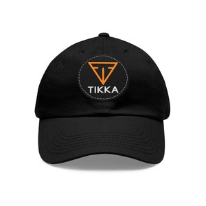 May include: Black baseball cap with a black and orange logo patch that says "TIKKA" in white text.