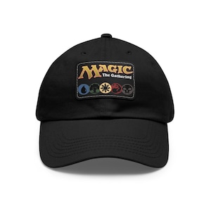 May include: Black baseball cap with a Magic: The Gathering logo patch featuring the five mana symbols in their respective colors.