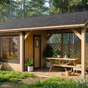 May include: A wooden outdoor structure with a dark gray shingled roof, a window, and a door. The structure has a wooden deck and a picnic table. The surrounding area is lush with green grass and trees.
