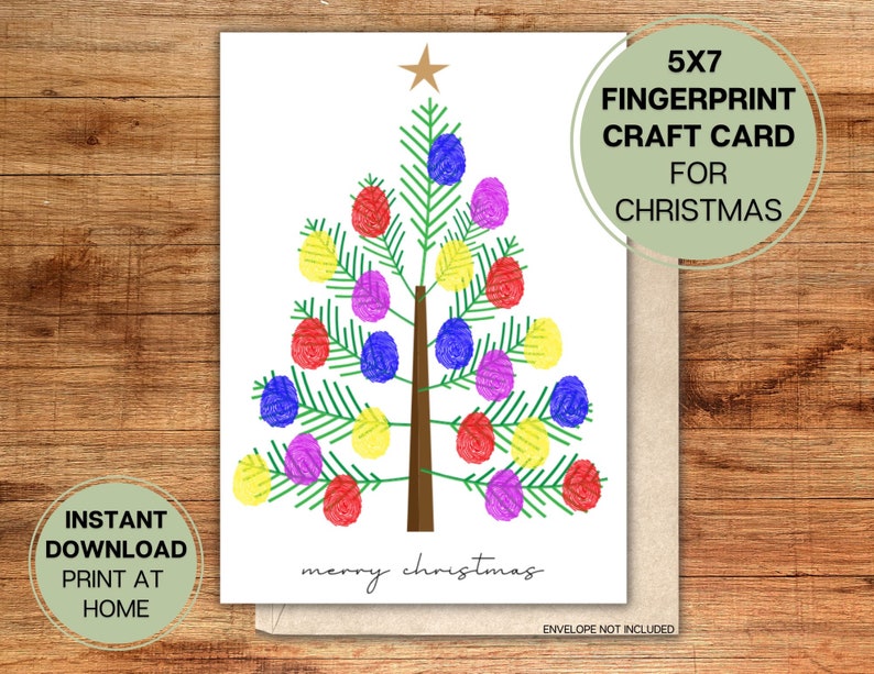 A printable Christmas card. The card shows a christmas tree, with baubles that look like they have been made from finger prints