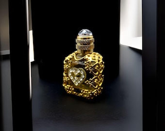 Leeg parfumminiatuur met zijn gouden raster en zijn strass-hart - 3,8 cm hoog - 2 kleuren verkrijgbaar - Geleverd in een zakje