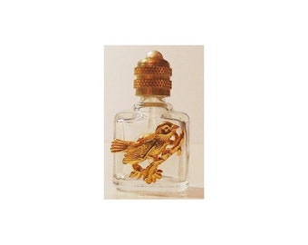 Small miniature of perfume decorated with a golden blackbird