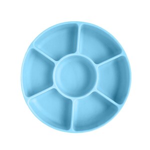 May include: A light blue silicone divided plate with six sections. The plate is round and has a raised edge.