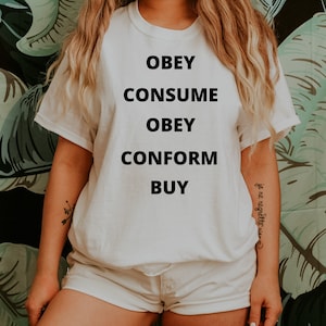 OBEY CONSUME CONFORM They Live Political Movie Scary Unisex Jersey Short Sleeve Tee Horror Gift Idea T-Shirt