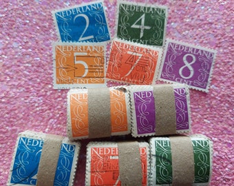 Nederlandse postzegels met centen afbeeldingen bundels 100 stuks 1946-1976