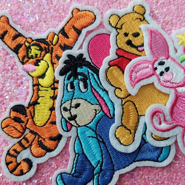 Babyhug Disney Knitted Full Sleeves Striped Design Pullover Sweater with Winnie The Pooh Patch - White & Orange main image 0