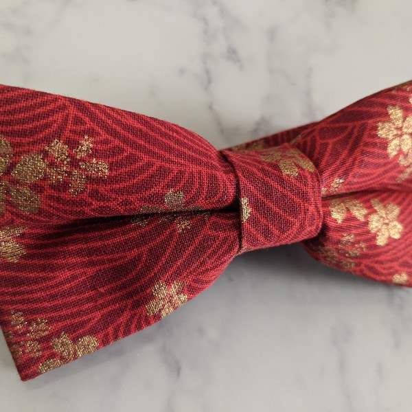 large gold bow tie