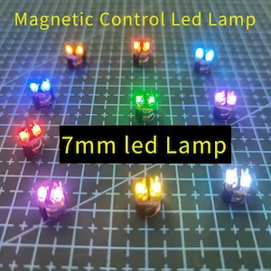 May include: A collection of small 7mm LED lamps arranged in a grid, each emitting a different colored light including red, blue, green, yellow, white, and purple. The text Magnetic Control Led Lamp and 7mm led Lamp is visible in the image.