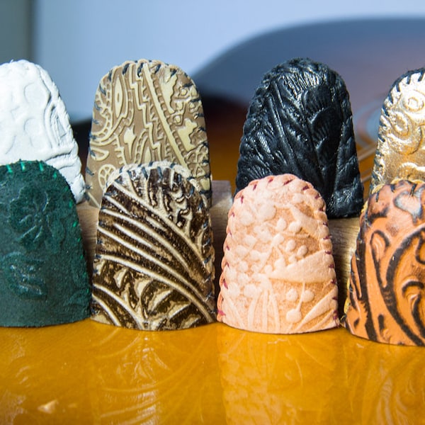 Tooled leather thimbles