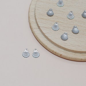 Lot breloques mini coquillages argent en acier inoxydable pour création de bijoux