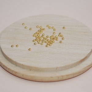 Set of 25 gold-plated stainless steel crimp beads 2mm for jewelry making