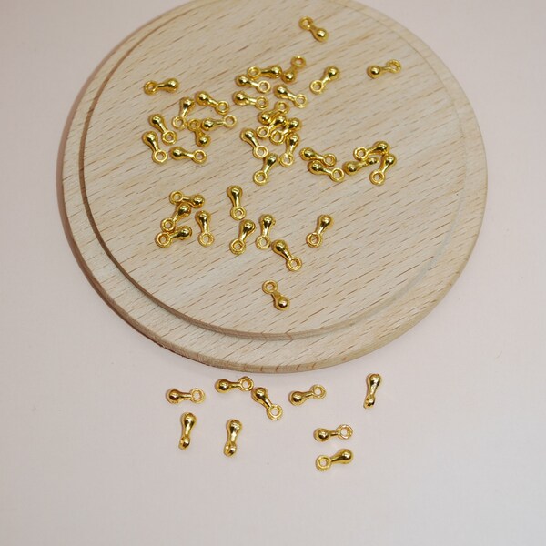 Lot de 20 perles mini gouttes dorées 7mm pour création de bijoux