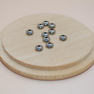 Set of 10 stainless steel silver 6x3mm separator spinning top beads for jewelry making
