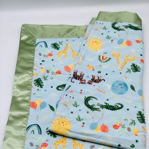 Zoo Animals Flannel Baby Blanket: Crocodiles, Giraffes, Balloons, Satin Trim