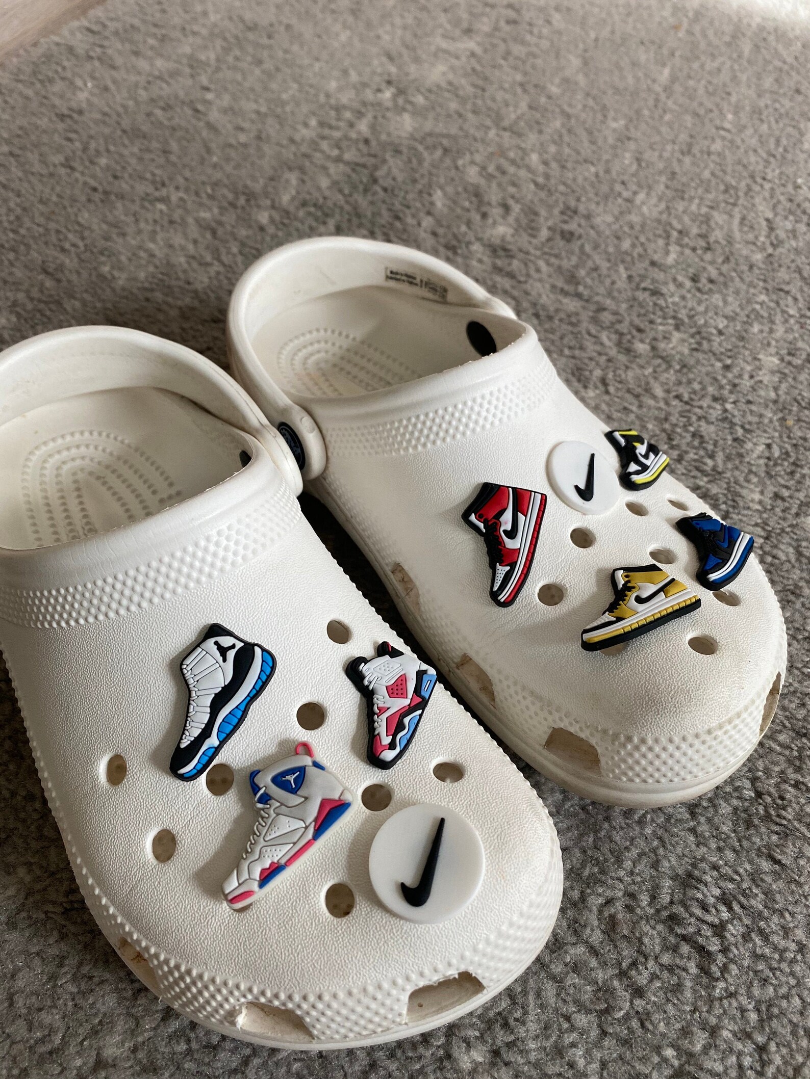 nike charm sneakers