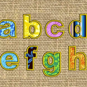 May include: A set of colourful fabric letters, a through h, with a yellow, blue, pink, black, and orange background. The letters are outlined in yellow.