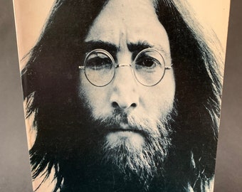 The Penguin John Lennon 1980 Paperback contains In His Own Write and A Spaniard in the Works