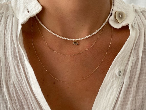 Zodiac pearl necklace deals