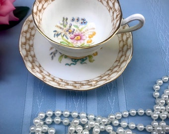 Vintage Royal Albert Footed  Floral Teacup and Saucer Set