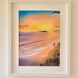 May include: A painting depicting a beach scene with a sunset in the background. The painting is executed in a realistic style and shows a couple walking along the beach.