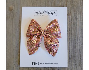 Noeud pour cheveux pailleté or rose : grosse barrette pour fille