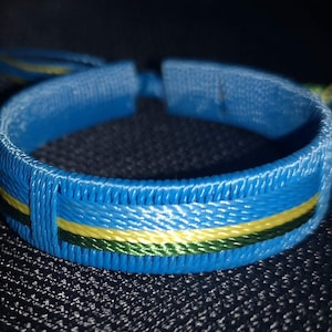 Rwanda - Wristband made by local artists from Nairobi