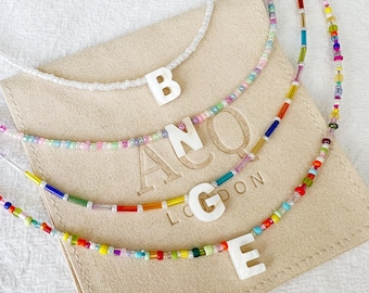 SAMPLE SALE - initial bead necklace with one mother of pearl letter bead and 33 colour options - silver plated clasp and extension chain