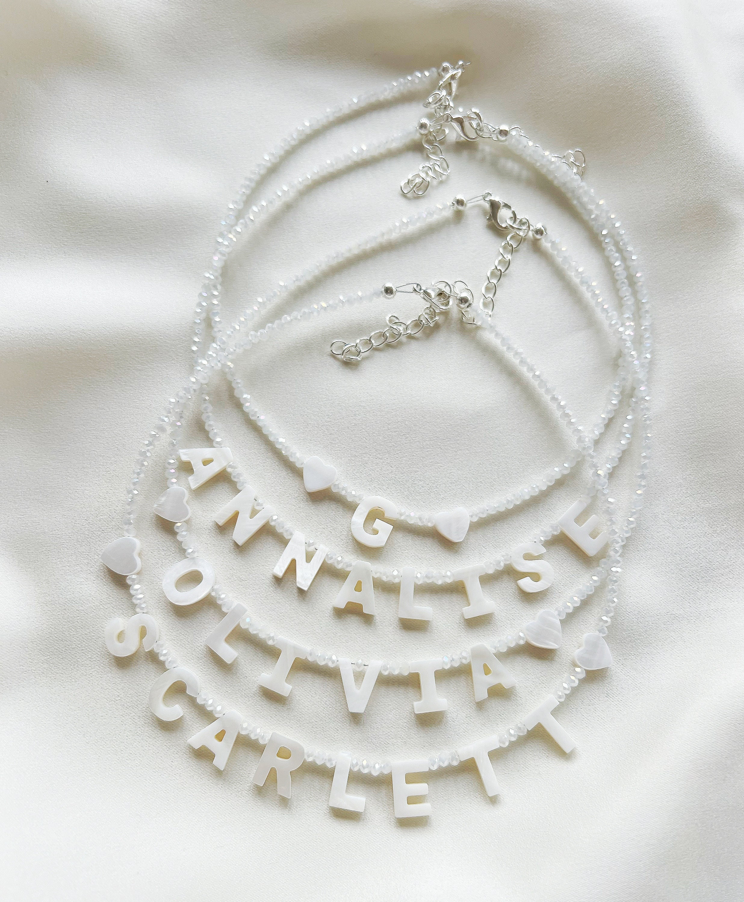 White glass bead name or word necklace personalised with mother of pearl letters - silver plated, sterling silver, or gold filled clasp
