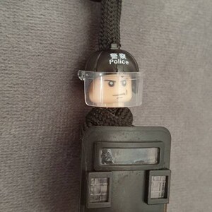 Police riot mini figure paracord keyring.