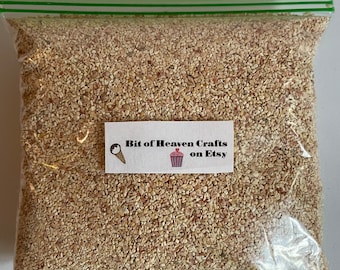 Graham Cracker Crumbs/Tiny Chopped Fake Nuts. Not Edible.