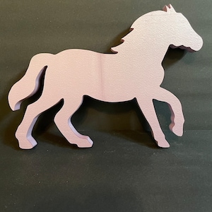Running Styrofoam Horse Cut Out. Cut 1”- 4” thick.
