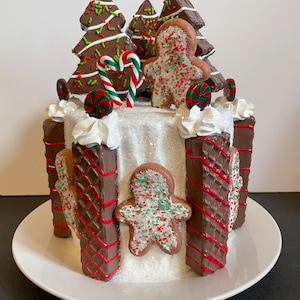 Christmas Little Debbie Chocolate Christmas Trees, Gingerbread Men, Nutter Butters Fake Cake. Fun Centerpiece for your Christmas Decor.