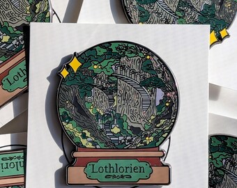 Pin de esmalte duro con forma de bola de nieve de Lothlórien