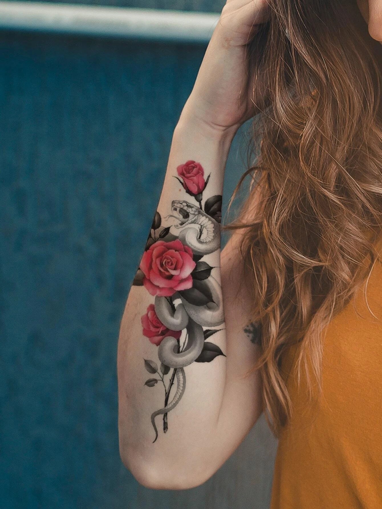 upper arm rose tattoos for women