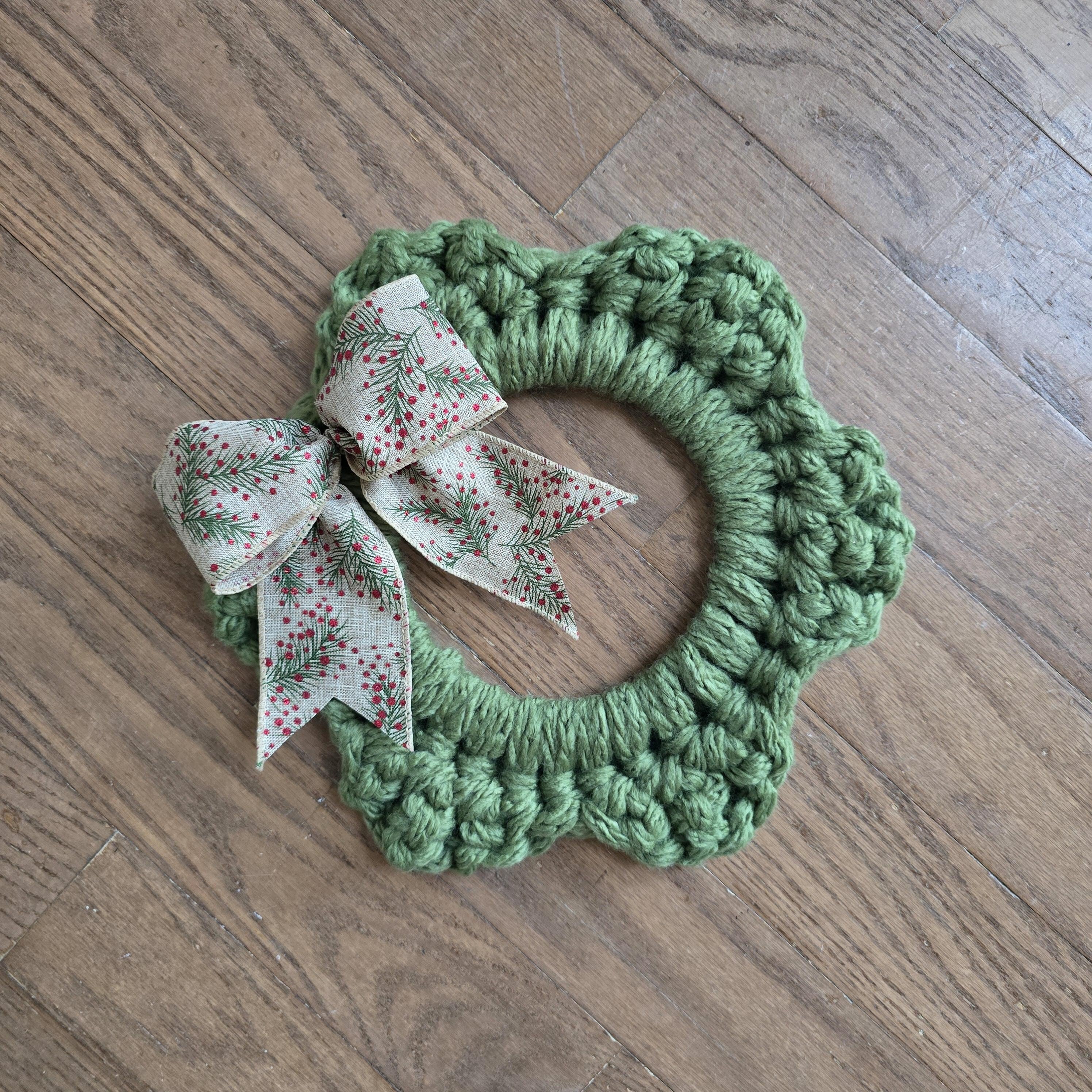 16 Cozy Christmas Wreaths to Welcome the Season 4 Chunky Crochet Christmas Wreath: Green Yarn Holiday Decor