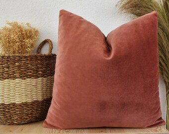 rose colored throw pillows