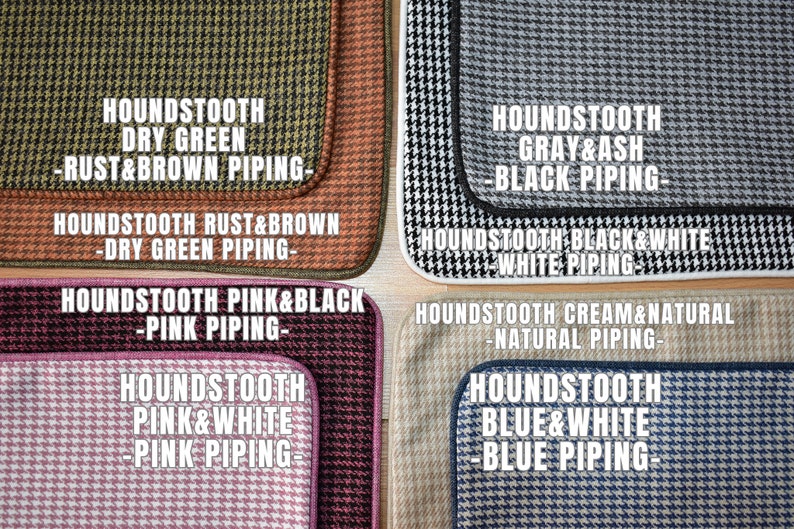 May include: A set of eight houndstooth patterned rugs with different color combinations and piping. The rugs are arranged in two rows of four. The top row features dry green, rust and brown, gray and ash, and black and white. The bottom row features pink and black, pink and white, cream and natural, and blue and white.