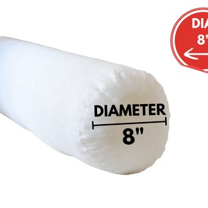 May include: White cylindrical pillow with a diameter of 8 inches. The pillow is made of a soft, white fabric and is perfect for sleeping or lounging.