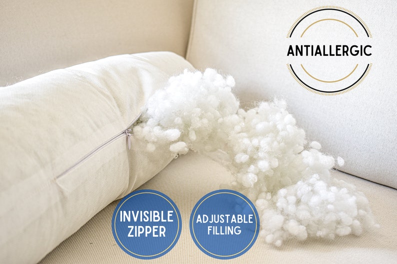 May include: A white pillow with an invisible zipper and adjustable filling. The pillow is hypoallergenic and has a white cotton filling. The pillow is shown on a beige couch.