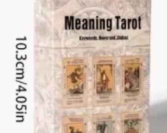 May include: A rectangular box for Meaning Tarot cards featuring a beige background with vintage-style illustrations and text. The box measures 2.44 inches wide by 4.05 inches high and displays six tarot card designs on the front cover.